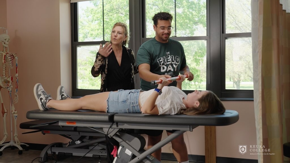 OT faculty and student demonstrating an exercise